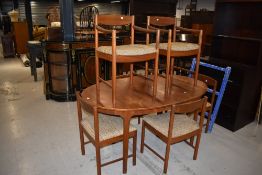 A vintage teak table and chairs, by McIntosh (chairs numbered 4003)