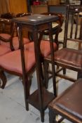 A late 19th or early 20th Century oak plant stand