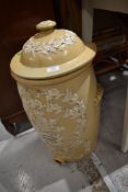 An Antique stoneware urn, with typical relief decoration, impressed mark Lipscombe and Co, damage to