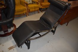 A reproduction chaise longue, Corbusier design (LC4)