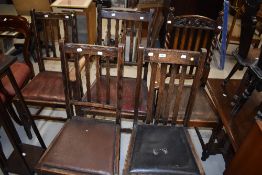 A set of 4 (3+1), early 20th century oak slat back dining chairs on bobbin legs, and a similar
