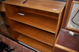 A vintage wood laminate bookcase, width approx. 82cm