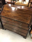 A 19th Century mahogany bureau, in the Georgian style, key included