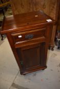 A reproduction mahogany pot cupboard in the Victorian style, key included