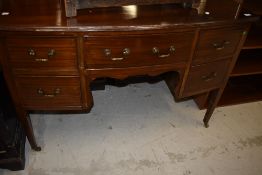 A reproduction desk or small side board having mahogany front with brass handle
