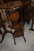 An Edwardian oak framed cake stand The Monoplane