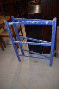 A vintage painted folding clothes horse