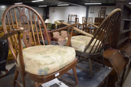Two vintage Ercol armchairs, ideal refurb project