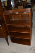 An adjustable shelf unit