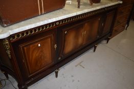 An Empire style reproduction side board breakfast bar having ormalu details with marble top