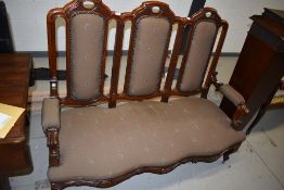 A Victorian style triple back settee having mahogany frame and modern upholstery, width approx.