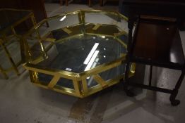 A high quality brass and glass coffee table of octagonal form, width approx.102cm