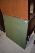 A fold out card or games table with felt top