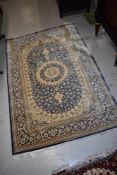A Persian rug, approx. 149 x 97cm