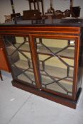 A late Victorian side board display case having rolled glass and beaded frontage with inlayed