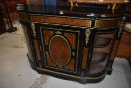 An impressive Empire style ebonised cabinet with rouge and brass detailing, width approx. 168cm (key