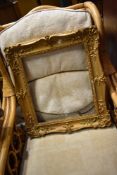 An antique gilt and gesso picture frame