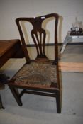 A period oak vase back chair having seagrass seat
