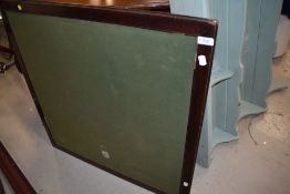 A vintage mahogany patent folding card table