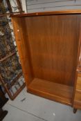 A modern teak effect adjustable bookcase, w 78cm