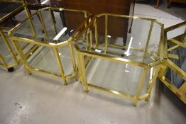 A pair of high quality brass and glass occasional/coffee tables