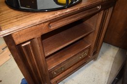 A media centre cabinet having drawers storage and shelf