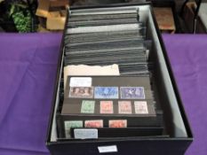 A box containing 400+ small stock cards of Commonwealth Stamps, mint & used, early stamps, very
