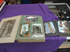 A large album of Vintage Postcards, early cards seen and a small vintage Postcard album containing