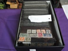 A box containing 400+ small stock cards of World Stamps, mint & used, early stamps, very little if
