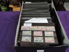 A box containing 400+ small stock cards of Commonwealth Stamps, mint & used, early stamps, very