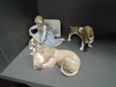 Three Lladro Studies and Figure Groups, Painful Lion 5022, Basset 1066, Dog's Best Friend 5688 and a