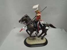 A modern Ballantynes study, 16th Lancers Aliwal 1848, solider on galloping horse