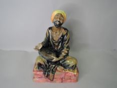 A Royal Doulton Figure, Mendicant HN1365