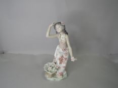 A Lladro Figurine, Hawaiian Dancer, model no 1478