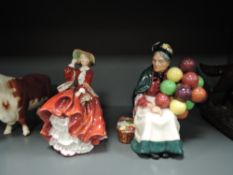 Two Royal Doulton figurines, Top O The Hill HN1834 and The Old Balloon Seller HN1315