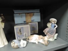 Two Lladro studies and a Lladro figurine, Cow, lying 4680, Sweet Scent 5221 and Ducking 4895, all