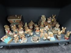 A large collection of Pendelfin bunny rabbit figures including caravan