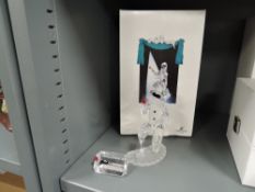 A crystal glass Swarovski figure study of a Harlequin with box