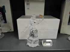 A crystal glass Swarovski figure study of the Columbine annual figurine with box