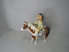 A Beswick study, Mounted Indian, skewbald gloss, 1391