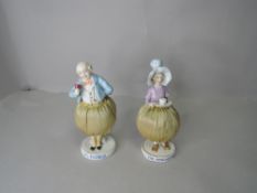 A pair of early 20th century Pin Cushion and Porcelain studies, Mr Pickwick, marked 19 to base and