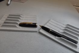 A Sheaffer Imperial I cartridge fountain pen in black with a single band to the cap having a