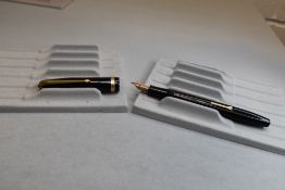 A Conway Stewart 85L leverfill fountain pen in black with single broad band to the cap having Conway