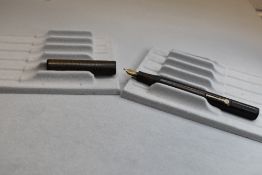 A Conway Stewart The Scribe leverfill fountain pen in BHR (discoloured) having a Conway Stewart 14ct