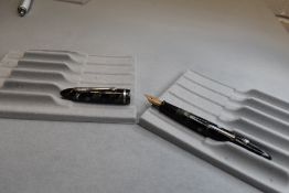 A Sheaffer Balance Lifetime leverfill fountain pen in black and grey marble with single band to