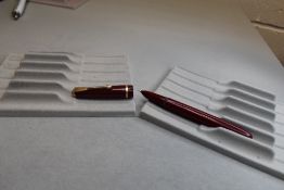 A Parker Lady Duofold fountain pen in red with single decorative band to cap. Approx 10.6cm