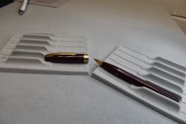 A Sheaffer Imperial III Touchdown plunger fill fountain pen in burgundy with a broad band to the cap