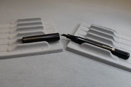 A Conway Stewart Scribe 330 leverfill fountain pen in chaised BHR having a Conway Stewart 14ct