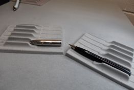 A Sheaffer Imperial I Touchdown plunger fill fountain pen in black with a steel cap having a