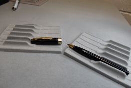 A Sheaffer Imperial III Touchdown plunger fill fountain pen in black with a single band to the cap